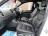 USED 2015 65 VOLKSWAGEN TIGUAN 2.0 R LINE EDITION TDI BMT 4MOTION DSG 5d 181 BHP Finished in PURE WHITE with contrasting HEATED EBONY LEATHER trim. This high spec Tiguan has a more sophisticated look to add to its high quality interior and high spec. Features include, Full Heated Leather, Sat Nav, DAB Radio, 19" ALLOYS, Auto Parking, Cruise control, Keyless Start, Front and Rear Park Sensors and much more. Dealer serviced at 6477 miles, 13821 miles, 19527 miles, 29132 miles, 32847 miles (Cam Belt and Water Pump) and at 38634 miles. MOT due 26/7/2022.