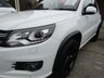 USED 2015 65 VOLKSWAGEN TIGUAN 2.0 R LINE EDITION TDI BMT 4MOTION DSG 5d 181 BHP Finished in PURE WHITE with contrasting HEATED EBONY LEATHER trim. This high spec Tiguan has a more sophisticated look to add to its high quality interior and high spec. Features include, Full Heated Leather, Sat Nav, DAB Radio, 19" ALLOYS, Auto Parking, Cruise control, Keyless Start, Front and Rear Park Sensors and much more. Dealer serviced at 6477 miles, 13821 miles, 19527 miles, 29132 miles, 32847 miles (Cam Belt and Water Pump) and at 38634 miles. MOT due 26/7/2022.