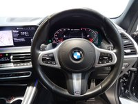 USED 2019 68 BMW X5 3.0 M50D 5d 395 BHP THIS INCREDIBLE SPORTS UTILITY VEHICLE COMES IN GLEAMING BLACK, IT IS THE EPITOME OF COMFORT, STYLE AND POWER, IT HAS AN AMAZING SET OF FEATURES INCLUDING 22" M ALLOY WHEELS, BMW DIGITAL PRO LIVE COCKPIT, SKY LOUNGE PANORAMIC SUNROOF, 3D PARKING CAMERA WITH PARK ASSIST, 12.3" SAT NAV, MEDIA INTERFACE SCREEN WITH BLUETOOTH AUDIO CONNECTION, 20GB HDD AND DAB RADIO, HARMON/KARDON SOUND SYSTEM, APPLE CAR PLAY, GESTURE CONTROL, HEATED LEATHER ELECTRIC ADJUST MEMORY SEATS, HEATED & COOLED CUP HOLDERS,