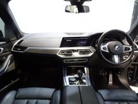 USED 2019 68 BMW X5 3.0 M50D 5d 395 BHP THIS INCREDIBLE SPORTS UTILITY VEHICLE COMES IN GLEAMING BLACK, IT IS THE EPITOME OF COMFORT, STYLE AND POWER, IT HAS AN AMAZING SET OF FEATURES INCLUDING 22" M ALLOY WHEELS, BMW DIGITAL PRO LIVE COCKPIT, SKY LOUNGE PANORAMIC SUNROOF, 3D PARKING CAMERA WITH PARK ASSIST, 12.3" SAT NAV, MEDIA INTERFACE SCREEN WITH BLUETOOTH AUDIO CONNECTION, 20GB HDD AND DAB RADIO, HARMON/KARDON SOUND SYSTEM, APPLE CAR PLAY, GESTURE CONTROL, HEATED LEATHER ELECTRIC ADJUST MEMORY SEATS, HEATED & COOLED CUP HOLDERS,