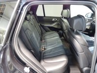 USED 2019 68 BMW X5 3.0 M50D 5d 395 BHP THIS INCREDIBLE SPORTS UTILITY VEHICLE COMES IN GLEAMING BLACK, IT IS THE EPITOME OF COMFORT, STYLE AND POWER, IT HAS AN AMAZING SET OF FEATURES INCLUDING 22" M ALLOY WHEELS, BMW DIGITAL PRO LIVE COCKPIT, SKY LOUNGE PANORAMIC SUNROOF, 3D PARKING CAMERA WITH PARK ASSIST, 12.3" SAT NAV, MEDIA INTERFACE SCREEN WITH BLUETOOTH AUDIO CONNECTION, 20GB HDD AND DAB RADIO, HARMON/KARDON SOUND SYSTEM, APPLE CAR PLAY, GESTURE CONTROL, HEATED LEATHER ELECTRIC ADJUST MEMORY SEATS, HEATED & COOLED CUP HOLDERS,