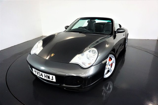 2004 04 Porsche 911 996 C4S CABRIOLET 3.6-FACTORY X51 ENGINE UPGRADE-LOW MILEAGE EXAMPLE FINISHED IN SLATE GREY-BLACK LEATHER-ALUMINIUM FINISH INSTRUMENT DIALS-SPORTS EXHAUST SYSTEM-HEATED FRONT SEATS-18