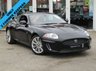 USED 2011 11 JAGUAR XK 5.0 XK 2d 385 BHP Finished in BLACK AMETHYST METALLIC with contrasting BLACK HEATED LEATHER. This eyecatching car has Space, Pace and Grace. It almost has the same 'wow' factor as cars such as the Aston Martin V8 Vantage, without the sky-high running costs. Features include Sat Nav, Heated Memory Leather Seats, Park Sensors, 19" Alloys, B/Tooth, Cruise Control and much more. Dealer serviced at 12311 miles, 25895 miles, 44266 miles, 55878 miles, 58581 miles, 61324 miles, 64010 miles, 67903 miles, and 70434 miles.