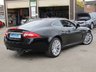USED 2011 11 JAGUAR XK 5.0 XK 2d 385 BHP Finished in BLACK AMETHYST METALLIC with contrasting BLACK HEATED LEATHER. This eyecatching car has Space, Pace and Grace. It almost has the same 'wow' factor as cars such as the Aston Martin V8 Vantage, without the sky-high running costs. Features include Sat Nav, Heated Memory Leather Seats, Park Sensors, 19" Alloys, B/Tooth, Cruise Control and much more. Dealer serviced at 12311 miles, 25895 miles, 44266 miles, 55878 miles, 58581 miles, 61324 miles, 64010 miles, 67903 miles, and 70434 miles.