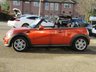 USED 2012 62 MINI CONVERTIBLE 1.6 COOPER 2d 122 BHP Finished in VOLCANIC ORANGE PEARL with contrasting, Black HEATED PART LEATHER Trim. This Mini is a cool and classy looking Convertible. It feels sporty and is great fun to drive. Features include, Heated Part Leather seats, Rear Park Sensors, Blue Tooth, DAB RADIO, Climate, Alloys, Low mileage and much more. Dealer serviced at 16698 miles, 21901 miles, 27673 miles, 32297 miles, 35182 miles and at 72998 miles. MOT due 24/1/2023.