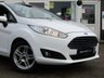USED 2013 63 FORD FIESTA 1.0 ZETEC 5d 99 BHP Finished in FROZEN WHITE with contrasting DARK GREY Cloth interior trim. This Fiesta is a small family 5 door car that you can really enjoy driving. Economical and cheap to run, stylish to look at and some great features. Specification includes, Zero road tax, B/Tooth, Alloys, Air Con, Heated front Screen, Rear Park sensors and much more, makes this a must for the first time driver or small family. Dealer Serviced at 5544 miles, 5742 miles, 8547 miles, 19803 miles and on arrival at EMC.