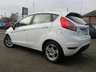 USED 2013 63 FORD FIESTA 1.0 ZETEC 5d 99 BHP Finished in FROZEN WHITE with contrasting DARK GREY Cloth interior trim. This Fiesta is a small family 5 door car that you can really enjoy driving. Economical and cheap to run, stylish to look at and some great features. Specification includes, Zero road tax, B/Tooth, Alloys, Air Con, Heated front Screen, Rear Park sensors and much more, makes this a must for the first time driver or small family. Dealer Serviced at 5544 miles, 5742 miles, 8547 miles, 19803 miles and on arrival at EMC.