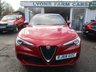 USED 2019 68 ALFA ROMEO STELVIO 2.9 V6 BI-TURBO QUADRIFOGLIO Q4 5d 503 BHP AUTOMATIC ALL WHEEL DRIVE *&pound;7,000 FACTORY EXTRAS* *&pound;7,000+ of factory fitted extras including; Power Sunroof, Power Seats Pack, 20" Dark 5-Hole Alloy Wheels, Sound Theatre by Harman Kardon, Leather/Alcantara Sports Seats in Black with Red Stitching and Red Lower Dash and Door Panel, Quadrifoglio Leather/Alcantara Flat Bottomed Sports Steering Wheel with Carbon Insert, Red Brake Calipers + Competizione Red Tri-coat Finish*