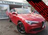 USED 2019 68 ALFA ROMEO STELVIO 2.9 V6 BI-TURBO QUADRIFOGLIO Q4 5d 503 BHP AUTOMATIC ALL WHEEL DRIVE *&pound;7,000 FACTORY EXTRAS* *&pound;7,000+ of factory fitted extras including; Power Sunroof, Power Seats Pack, 20" Dark 5-Hole Alloy Wheels, Sound Theatre by Harman Kardon, Leather/Alcantara Sports Seats in Black with Red Stitching and Red Lower Dash and Door Panel, Quadrifoglio Leather/Alcantara Flat Bottomed Sports Steering Wheel with Carbon Insert, Red Brake Calipers + Competizione Red Tri-coat Finish*