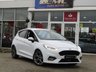 USED 2018 67 FORD FIESTA 1.0 ST-LINE 5d 138 BHP Finished in Frozen White with contrasting GREY Sports Cloth interior trim. This Fiesta is a small family 5 door car that you can really enjoy driving. Economical and cheap to run, stylish to look at and some great features. Specification includes, Sat Nav, B/Tooth, DAB Radio, Rear Park Sensors, Cruise control, Alloys, Air Con and much more, makes this a must for the first time driver or small family. Dealer Serviced at 11831 miles, 22096 miles, 35053 miles and at 49037 miles on 11/01/2022.