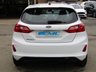 USED 2018 67 FORD FIESTA 1.0 ST-LINE 5d 138 BHP Finished in Frozen White with contrasting GREY Sports Cloth interior trim. This Fiesta is a small family 5 door car that you can really enjoy driving. Economical and cheap to run, stylish to look at and some great features. Specification includes, Sat Nav, B/Tooth, DAB Radio, Rear Park Sensors, Cruise control, Alloys, Air Con and much more, makes this a must for the first time driver or small family. Dealer Serviced at 11831 miles, 22096 miles, 35053 miles and at 49037 miles on 11/01/2022.