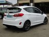 USED 2018 67 FORD FIESTA 1.0 ST-LINE 5d 138 BHP Finished in Frozen White with contrasting GREY Sports Cloth interior trim. This Fiesta is a small family 5 door car that you can really enjoy driving. Economical and cheap to run, stylish to look at and some great features. Specification includes, Sat Nav, B/Tooth, DAB Radio, Rear Park Sensors, Cruise control, Alloys, Air Con and much more, makes this a must for the first time driver or small family. Dealer Serviced at 11831 miles, 22096 miles, 35053 miles and at 49037 miles on 11/01/2022.