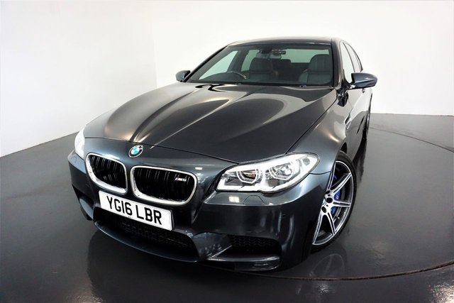 2016 16 BMW M5 4.4 M5 4d AUTO COMPETITION PACKAGE-RUNNING IN SERVICE AT 861 MILES-TRACKSTAR CAT 5 SYSTEM-ADAPTIVE SUSPENSION-REVERSE CAMERA-SUNROOF-LUMBAR SUPPORT-BLACK MERINO LEATHER-HEATED FRONT SEATS-AMBIENT INTERIOR LIGHTING-HIGH BEAM ASSIST-HEAD UP DISPLAY-PROFESSIONAL NAVIGATION-DAB RADIO-HARMAN KARDON-HIGH GLOSS SHADOWLINE-CLIMATE CONTROL