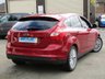 USED 2011 61 FORD FOCUS 1.6 ZETEC 5d 104 BHP Finished in Sangria Red Metallic with contrasting Grey cloth trim. This is a modern day peoples car. It is a reliable, practical and affordable vehicle that is liked by everyone. Great features which include B/Tooth, DAB radio, Appearance Pack, Alloys Front Fogs and much more. Dealer serviced at 19889 miles, 34109 miles, 43366 miles, 54058 miles, 62887 miles, 73721 miles, 79530 miles, 87244 miles (Cam Belt) and on arrival at 92926 miles.