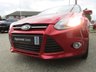 USED 2011 61 FORD FOCUS 1.6 ZETEC 5d 104 BHP Finished in Sangria Red Metallic with contrasting Grey cloth trim. This is a modern day peoples car. It is a reliable, practical and affordable vehicle that is liked by everyone. Great features which include B/Tooth, DAB radio, Appearance Pack, Alloys Front Fogs and much more. Dealer serviced at 19889 miles, 34109 miles, 43366 miles, 54058 miles, 62887 miles, 73721 miles, 79530 miles, 87244 miles (Cam Belt) and on arrival at 92926 miles.