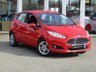 USED 2014 14 FORD FIESTA 1.0 ZETEC 5d 99 BHP Finished in Special Edition RACE RED with contrasting GREY Cloth interior trim. This Fiesta is a small family 5 door car that you can really enjoy driving. Economical and cheap to run, stylish to look at and some great features. Specification includes, Zero road tax, B/Tooth, Alloys, Air Con, Heated front Screen and much more, makes this a must for the first time driver or small family. Dealer Serviced at 6526 miles, 12952 miles, 19667 miles, 29557 miles, 49920 miles, 75555 miles and on arrival
