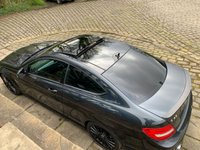 USED 2012 62 MERCEDES-BENZ C-CLASS 6.2 C63 AMG 2d 457 BHP C63 6.3 V8 AUTOMATIC COUPE - HUGE SPEC - FULL MERCEDES HISTORY - FULL BLACK LEATHER - SATELLITE NAVIGATION - PANORAMIC GLASS ROOF - NOT FOR THE FAINT HEARTED !!!