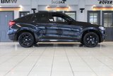 USED 2017 67 BMW X6 3.0 XDRIVE30D M SPORT 4d 255 BHP M SPORT PLUS PACKAGE + PANORAMIC GLASS SUNROOF + DIGITAL DASH DISPLAY + HEAD UP DISPLAY + PROFESSIONAL SATELLITE NAVIGATION + HARMAN KARDON SOUND SYSTEM + ENHANCED BLUETOOTH PHONE PREPARATION WITH WIRELESS CHARGING + REAR VIEW CAMERA + APPS CONTROL + TV FUNCTION + APPLE CARPLAY PREPARATION + AUTOMATIC AIR CONDITIONING +  DUAL ZONE CLIMATE CONTROL + ELECTRICALLY ADJUSTABLE LEATHER MULTIFUNCTIONAL STEERING WHEEL WITH PADDLE SHIFT GEAR SELECT + DAB DIGITAL RADIO + KEYLESS START