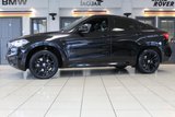 USED 2017 67 BMW X6 3.0 XDRIVE30D M SPORT 4d 255 BHP M SPORT PLUS PACKAGE + PANORAMIC GLASS SUNROOF + DIGITAL DASH DISPLAY + HEAD UP DISPLAY + PROFESSIONAL SATELLITE NAVIGATION + HARMAN KARDON SOUND SYSTEM + ENHANCED BLUETOOTH PHONE PREPARATION WITH WIRELESS CHARGING + REAR VIEW CAMERA + APPS CONTROL + TV FUNCTION + APPLE CARPLAY PREPARATION + AUTOMATIC AIR CONDITIONING +  DUAL ZONE CLIMATE CONTROL + ELECTRICALLY ADJUSTABLE LEATHER MULTIFUNCTIONAL STEERING WHEEL WITH PADDLE SHIFT GEAR SELECT + DAB DIGITAL RADIO + KEYLESS START