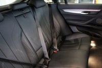 USED 2017 67 BMW X6 3.0 XDRIVE30D M SPORT 4d 255 BHP M SPORT PLUS PACKAGE + PANORAMIC GLASS SUNROOF + DIGITAL DASH DISPLAY + HEAD UP DISPLAY + PROFESSIONAL SATELLITE NAVIGATION + HARMAN KARDON SOUND SYSTEM + ENHANCED BLUETOOTH PHONE PREPARATION WITH WIRELESS CHARGING + REAR VIEW CAMERA + APPS CONTROL + TV FUNCTION + APPLE CARPLAY PREPARATION + AUTOMATIC AIR CONDITIONING +  DUAL ZONE CLIMATE CONTROL + ELECTRICALLY ADJUSTABLE LEATHER MULTIFUNCTIONAL STEERING WHEEL WITH PADDLE SHIFT GEAR SELECT + DAB DIGITAL RADIO + KEYLESS START