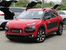 USED 2016 65 CITROEN C4 CACTUS 1.2 PURETECH FLAIR S/S 5d 109 BHP Finished in SPORT RED with contrasting dark trim. The C4 Cactus is one of the most quirky and unusual SUV crossovers on the market. Eye catching, economical and easy to drive family car. Features include Zero Road Tax, Sat Nav, Rear View Camera, DAB, Park Sensors, Blue Tooth and much more. Dealer serviced at 3949 miles, 9322 miles, 12928 miles, 17265 miles and at 21026 miles.