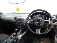USED 2009 K MAZDA MX-5 1.8 I SE 2d 125 BHP THIS FANTASTIC TWO-SEATER SPORTS CAR COMES FINISHED IN GLEAMING BLUE, THE CAR IS GREAT FUN TO DRIVE. IT COMES WITH ALLOY WHEELS, ELECTRIC WINDOWS, A CONVERTIBLE ROOF, CD/RADIO, TWIN CHROME EXHAUST, SPORT SEATS, A LEATHER CLAD MULTIFUNCTION STEERING WHEEL, AND MORE!