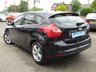 USED 2012 62 FORD FOCUS 1.0 ZETEC 5d 99 BHP Finished in PANTHER BLACK METALLIC with GREY Cloth Trim. This is a modern day peoples car. With &pound;20 Road Tax and great fuel economy. It is a economical, reliable, practical and affordable vehicle that is liked by everyone. Great features which include &pound;20 Road Tax, B/Tooth, DAB radio, Park Sensors, Heated Front Screen, Alloys Front Fogs and much more. FORD DEALER SERVICED at 7949 miles, 16748 miles, 24150 miles, 28224 miles, 32194 miles, 36683 miles and at 40813 miles.