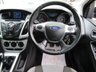 USED 2012 62 FORD FOCUS 1.0 ZETEC 5d 99 BHP Finished in PANTHER BLACK METALLIC with GREY Cloth Trim. This is a modern day peoples car. With &pound;20 Road Tax and great fuel economy. It is a economical, reliable, practical and affordable vehicle that is liked by everyone. Great features which include &pound;20 Road Tax, B/Tooth, DAB radio, Park Sensors, Heated Front Screen, Alloys Front Fogs and much more. FORD DEALER SERVICED at 7949 miles, 16748 miles, 24150 miles, 28224 miles, 32194 miles, 36683 miles and at 40813 miles.