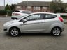USED 2015 65 FORD FIESTA 1.0 ZETEC 3d 99 BHP Finished in INGOT SILVER METALLIC with contrasting GREY Cloth interior trim. This Fiesta is a small family 3 door car that you can really enjoy driving. Economical and cheap to run, stylish to look at and some great features. Specification includes, Zero road tax, B/Tooth, Alloys, Air Con and Heated front Screen, makes this a must for the first time driver or small family. Serviced at 12349 miles, 24103 miles, 29391 miles, 40267 miles, 61751 miles, 72135 miles, 80596 miles and at 84157 miles.