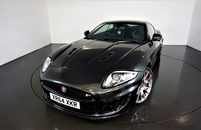 2014 64 Jaguar Xkr 5.0 DYNAMIC R 2d AUTO 503 BHP-The Redesigned XK or X150 model first debuted in 2005 at the Frankfurt motor show in Germany and was styled by Jaguar's chief designer Ian Callum. The XK combined extreme performance, renowned luxury and relevant technology, intuitively expressed to connect the driver to the car and the car to the road. World class technology is empowering but at the same time never over powers the driving experience and this successful recipe has now meant that this model has acquired new status, of a credible modern-day classic jaguar, due to the last cars offered in the July of 2014 and the sad end of the XK brand. Prior to the production ending, the factory offered us the fabulous jaguar XK Dynamic R model, with the all-aluminium sculptured body to house a Five litre V8 Supercharged monster that generated a rather healthy 503 bhp, which was more than capable of accelerating both the driver and passengers from 0-62 mph in just 4.6 seconds, with the dynamic model having fitted from factory with the jaguar speed package that would elegantly glide to a top speed of 174 mph. The Dynamic R came with extensive revisions to the suspension including a forged and fully machined front knuckle for improved steering precision, bespoke spring and damper settings and revised adaptive dynamics, all of which made this refined luxury coupe a full-bodied performance vehicle that delighted new and old clients to this prestigious car brand
