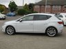 USED 2019 19 SEAT LEON 1.5 TSI EVO FR SPORT 5d 129 BHP Finished in NEVADA WHITE with FULL BLACK HEATED LEATHER. This Leon is a great all-rounder. It is great to drive, well equipped and roomy in the back, The 1.5 TSI 130 gives great economy (worth considering with the price of fuel). It is one of the very best sporty looking family cars. Features include Sat Nav, Full Heated Leather, DAB Radio, Virtual Dash, B/Tooth, Tinted Windows, 18" Alloys, Parking Sensors and much more. Just Servied with 12 Months MOT.