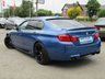 USED 2012 BMW M5 4.4 M5 4d 553 BHP Finished in MONTE CARLO BLUE with SILVERSTONE HEATED LEATHER TRIM. This has got to be the ultimate super saloon. This car offers incredible performance and ultimate luxury. This fantastic allrounder is one of the fastest family saloon around. Features include Sat Nav, Heated Leather, Pan Roof, DAB Radio, Soft Close Doors, Power rear Boot, Rear Camera, Heads Up Display, Memory seats and much much more. Dealer Serviced at 1122 miles, 15653 miles, 23386 miles, 34614 miles and at 41022 miles.