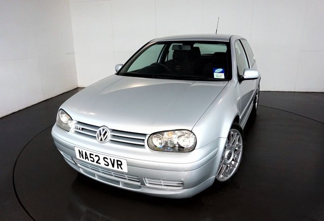 2002 52 Volkswagen Golf GTI ANNIVERSARY 1.8 3d-1 owner from new. A highly original and unmodified example of VW limited-run hot hatch, marking the 25-year anniversary since the Golf GTI launch in 1976.This is number 1,401 of the 1,800 special-edition cars sold in the UK.This Golf is finished in Reflex Silver metallic over a black and red cloth interior featuring a perforated leather steering wheel and Recaro seats accented by red lining. The car was last serviced in December 2021 at 47,804 miles. The vehicle has an extensive service history with 14 service stamps including 2 cambelt and water pump changes, the first in 2008 and the second in 2019. This is a great example of a modern classic. 