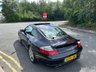 USED 2005 54 PORSCHE 911 3.6 996 TURBO S 2d -This incredibly rare, UK-supplied 2005 Porsche 911 (996) Turbo S is one of just 600 examples produced. Representing the absolute pinnacle of its generation, this single-owner vehicle combines track-ready supercar performance with everyday drivability.Performance & SpecificationsMezger Engine: Bulletproof twin-turbo 3.6-litre flat-six.X50 Power Kit: Factory-upgraded turbochargers and revised ECU.Power Output: 450 bhp and 457 lb-ft of torque.Top Speed: Exceeds the 190 mph barrier.Braking: Factory Porsche Ceramic Composite Brakes (PCCB) with yellow calipers.Premium Factory FeaturesExterior: Timeless Basalt Black metallic finish with an electric sunroof.Handling: Porsche Stability Management (PSM) for all-weather traction.Cabin: Bose surround sound, climate control, and electric memory seats.Aero: Electrically operated rear spoiler and stainless steel exhaust pipes.Unmatched Provenance,Originally purchased from Porsche Centre Cambridge in February 2005, this car has had just a single owner from new. Unmolested, one-owner examples of this limited run are highly prized investments in the modern classic market. 