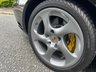 USED 2005 54 PORSCHE 911 3.6 996 TURBO S 2d -This incredibly rare, UK-supplied 2005 Porsche 911 (996) Turbo S is one of just 600 examples produced. Representing the absolute pinnacle of its generation, this single-owner vehicle combines track-ready supercar performance with everyday drivability.Performance & SpecificationsMezger Engine: Bulletproof twin-turbo 3.6-litre flat-six.X50 Power Kit: Factory-upgraded turbochargers and revised ECU.Power Output: 450 bhp and 457 lb-ft of torque.Top Speed: Exceeds the 190 mph barrier.Braking: Factory Porsche Ceramic Composite Brakes (PCCB) with yellow calipers.Premium Factory FeaturesExterior: Timeless Basalt Black metallic finish with an electric sunroof.Handling: Porsche Stability Management (PSM) for all-weather traction.Cabin: Bose surround sound, climate control, and electric memory seats.Aero: Electrically operated rear spoiler and stainless steel exhaust pipes.Unmatched Provenance,Originally purchased from Porsche Centre Cambridge in February 2005, this car has had just a single owner from new. Unmolested, one-owner examples of this limited run are highly prized investments in the modern classic market. 