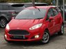 USED 2014 14 FORD FIESTA 1.0 ZETEC 5d 99 BHP Finished in RACE RED with contrasting GREY Cloth interior trim. This Fiesta is a small family 5 door car that you can really enjoy driving. Economical and cheap to run, stylish to look at and some great features. Specification includes, Zero road tax, B/Tooth, Alloys, Air Con, Heated front Screen and much more, makes this a must for the first time driver or small family. Just serviced with 12 months MOT.