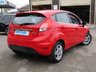 USED 2014 14 FORD FIESTA 1.0 ZETEC 5d 99 BHP Finished in RACE RED with contrasting GREY Cloth interior trim. This Fiesta is a small family 5 door car that you can really enjoy driving. Economical and cheap to run, stylish to look at and some great features. Specification includes, Zero road tax, B/Tooth, Alloys, Air Con, Heated front Screen and much more, makes this a must for the first time driver or small family. Just serviced with 12 months MOT.