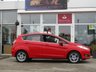 USED 2014 14 FORD FIESTA 1.0 ZETEC 5d 99 BHP Finished in RACE RED with contrasting GREY Cloth interior trim. This Fiesta is a small family 5 door car that you can really enjoy driving. Economical and cheap to run, stylish to look at and some great features. Specification includes, Zero road tax, B/Tooth, Alloys, Air Con, Heated front Screen and much more, makes this a must for the first time driver or small family. Just serviced with 12 months MOT.