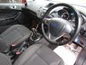 USED 2014 14 FORD FIESTA 1.0 ZETEC 5d 99 BHP Finished in RACE RED with contrasting GREY Cloth interior trim. This Fiesta is a small family 5 door car that you can really enjoy driving. Economical and cheap to run, stylish to look at and some great features. Specification includes, Zero road tax, B/Tooth, Alloys, Air Con, Heated front Screen and much more, makes this a must for the first time driver or small family. Just serviced with 12 months MOT.