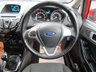 USED 2014 14 FORD FIESTA 1.0 ZETEC 5d 99 BHP Finished in RACE RED with contrasting GREY Cloth interior trim. This Fiesta is a small family 5 door car that you can really enjoy driving. Economical and cheap to run, stylish to look at and some great features. Specification includes, Zero road tax, B/Tooth, Alloys, Air Con, Heated front Screen and much more, makes this a must for the first time driver or small family. Just serviced with 12 months MOT.