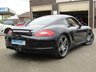 USED 2006 06 PORSCHE CAYMAN 3.4 24V S 2d 295 BHP Finished in PANTHER BLACK MET with contrasting CREAM SPORTS HEATED LEATHER SEATS. If you are looking for a sporty and stylish performance coupe without breaking the bank, then we recommend checking this little gem out. Features include 19" ALLOYS, BOSE, SAT NAV, B/TOOTH, CRUISE, ELECTRIC MEMORY LEATHER SEATS andPARK SENSORS just to list a few. Dealer serviced at 9657 miles, 13223 miles, 33720 miles, 47584 miles, 49181 miles,49349 miles, 49536 miles, 57309 miles, 68829 miles and at 73923 miles
