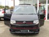 USED 2018 67 VOLKSWAGEN TRANSPORTER 2.0 T32 TDI KOMBI SPORTLINE BMT 201 BHP Finished in DEEP BLACK with BLACK LEATHER EMBOSED SEATS. This Transporter is a great drivers van. It has long been the icon of the british roads. This van is great value, practical, economical and versitile with its 6 seats. This Van is plus VAT.  Features include, 18" Alloys, Air Con, Cruise Control, Side Bars, Sport Line Kit, Rear Park Sensors, Rear camera and much more. Serviced at 20229 miles, 54938 miles,  102000 miles on arrival (inc Cam Belt and Water Pump).