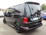 USED 2018 67 VOLKSWAGEN TRANSPORTER 2.0 T32 TDI KOMBI SPORTLINE BMT 201 BHP Finished in DEEP BLACK with BLACK LEATHER EMBOSED SEATS. This Transporter is a great drivers van. It has long been the icon of the british roads. This van is great value, practical, economical and versitile with its 6 seats. This Van is plus VAT.  Features include, 18" Alloys, Air Con, Cruise Control, Side Bars, Sport Line Kit, Rear Park Sensors, Rear camera and much more. Serviced at 20229 miles, 54938 miles,  102000 miles on arrival (inc Cam Belt and Water Pump).