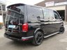 USED 2018 67 VOLKSWAGEN TRANSPORTER 2.0 T32 TDI KOMBI SPORTLINE BMT 201 BHP Finished in DEEP BLACK with BLACK LEATHER EMBOSED SEATS. This Transporter is a great drivers van. It has long been the icon of the british roads. This van is great value, practical, economical and versitile with its 6 seats. This Van is plus VAT.  Features include, 18" Alloys, Air Con, Cruise Control, Side Bars, Sport Line Kit, Rear Park Sensors, Rear camera and much more. Serviced at 20229 miles, 54938 miles,  102000 miles on arrival (inc Cam Belt and Water Pump).