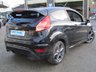 USED 2015 65 FORD FIESTA 1.6 ST 3d 180 BHP Finished in PANTHER BLACK with contrasting SPORTS interior trim. It is impossible to ignore that this is one seriously fun car. If you are after some old-school hot hatch fun, the ST is hard to beat. Punching out 180 BHP. Features include Alloys, Cruise, DAB, B/Tooth, LED day Lights, 2 Keys and much more. This Fiesta is a small car that you can really enjoy driving. Dealer serviced at 9741 miles, 24113 miles, 39667 miles, 54119 miles, 65298 miles and at 76772 miles on 31/10/2022.