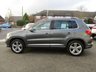 USED 2015 15 VOLKSWAGEN TIGUAN 2.0 R LINE TDI BLUEMOTION TECH 4MOTION DSG 5d 139 BHP This high spec Tiguan has a more sophisticated look to add to its high quality interior and high spec. In short this Tiguan is spacious, comfortable and great to drive, while its raised driving position gives you a great view. Features include, Sat Nav, DAB, B/Tooth, ALLOYS, Auto Parking, Front and Rear Park Sensors and much more. Dealer serviced at 6735 miles, 12792 miles, 21081 miles, 27308 miles, 31860 miles (inc Cam Belt and Water Pump), 33324 miles, and at 39241 miles (inc Haldex).