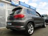 USED 2015 15 VOLKSWAGEN TIGUAN 2.0 R LINE TDI BLUEMOTION TECH 4MOTION DSG 5d 139 BHP This high spec Tiguan has a more sophisticated look to add to its high quality interior and high spec. In short this Tiguan is spacious, comfortable and great to drive, while its raised driving position gives you a great view. Features include, Sat Nav, DAB, B/Tooth, ALLOYS, Auto Parking, Front and Rear Park Sensors and much more. Dealer serviced at 6735 miles, 12792 miles, 21081 miles, 27308 miles, 31860 miles (inc Cam Belt and Water Pump), 33324 miles, and at 39241 miles (inc Haldex).