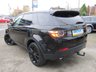 USED 2015 65 LAND ROVER DISCOVERY SPORT 2.0 TD4 HSE LUXURY 5d 180 BHP Finished in SANTORININ BLACK MET with contrasting BLACK HEATED LEATHER SEATS. This Discovery Sport is practical, incredible off road and a comfy SUV that has 7 Seats that will swallow your family and luggage. FEATURES include Black Pack, Panoramic Glass Roof, Electric Rear Boot, Leather Seats, Sat Nav, 20" ALLOYS, Rear View Cameras, Park sensors, Auto Parking, Tinted windows, heated & cooled seats and much more. Comes with 2 keys.