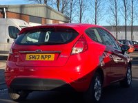 USED 2013 13 FORD FIESTA 1.0 ZETEC 3d 99 BHP THIS CAR COMES WITH 6 MONTHS WARRANTY , BREAKDOWN COVER & RECOVERY++   GOOD SERVICE HISTORY +   FORD SYNC +   BLUETOOTH +  AUX +   USB +   RACE RED EXTERIOR PAINT +   HEATED WINDSCREEN +   CENTER ARMREST AND STORAGE +   SPARE WHEEL +