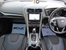 USED 2019 19 FORD MONDEO 2.0 ST-LINE EDITION TDCI 5d 177 BHP Finished in CHROME BLUE Met with contrasting EBONY HEATED LEATHER Trim. This popular New Shape spacious family hatch comes with improved quality and efficiency. Great to drive and economical to run. Features include 19" Alloys, SAT NAV, DAB Radio, B/Tooth, Full Heated Memory Leather Seats, Heated Front Screen, Power Folding Mirrors, Apple Car Play, Cruise and much more. Dealer serviced at 8575 miles, 16420 miles, 34157 miles and at 53407 miles.